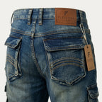 Close-up of stitched back pockets and branded leather patch on Fleecora blue cargo denim shorts