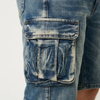 Detail shot of the side flap pocket on Fleecora men's mid-waist regular-fit blue cargo denim shorts
