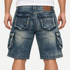 Rear waist-down view of Fleecora men's mid-waist regular-fit blue cargo denim shorts on a standing model