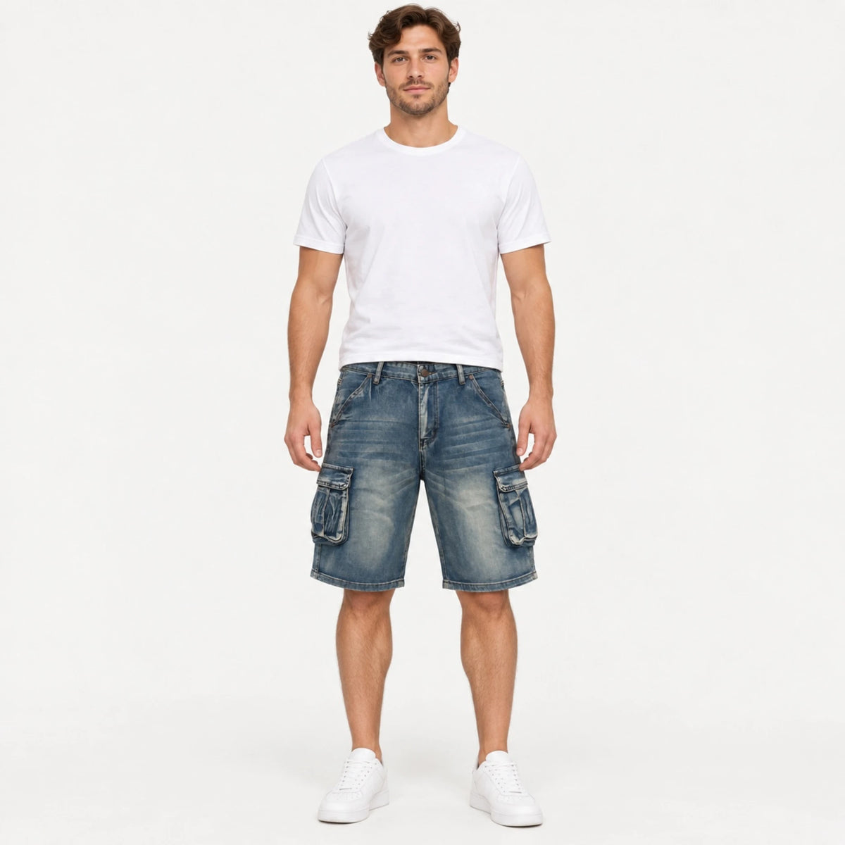 Model standing in a full front studio shot wearing Fleecora men's mid-waist regular-fit blue cargo denim shorts